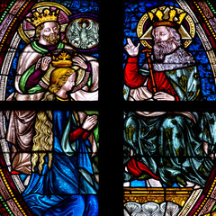 Mary crowned in heaven. Stained glass.
