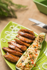 Prepared chicken with stuffed zucchini