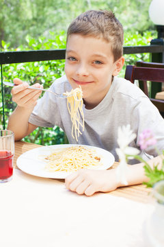 Child Eating Pasta