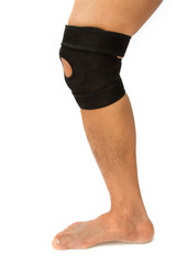man legs with one knee in a protective knee brace