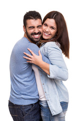 Couple posing over white background