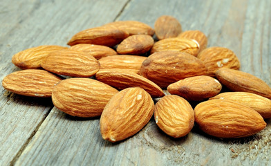 peeled almonds on a wooden table