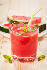 Glass of fresh juice from watermelon with mint