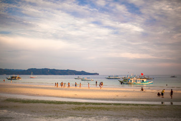 Fototapeta na wymiar Crowded beach on the island of Boracay, Philippines
