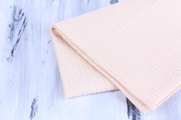Kitchen towels on wooden background