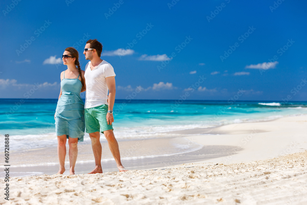 Canvas Prints couple standing at beach