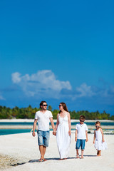 Family walking at beach