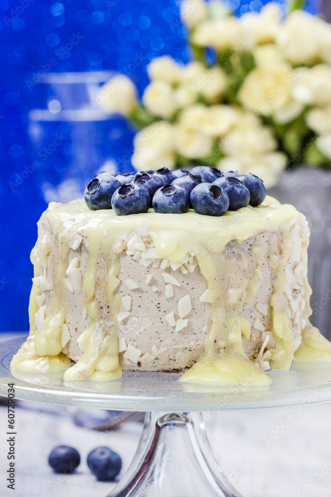 Wall mural White chocolate cake decorated with blueberries. Bouquet