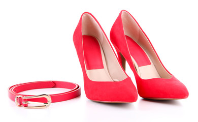 Beautiful red female shoes and belt, isolated on white