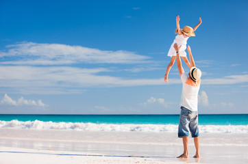 Father and daughter at beach