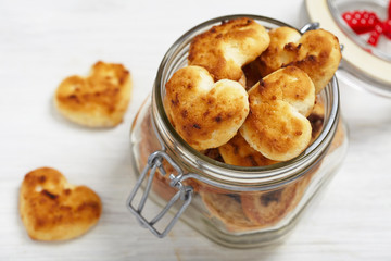 Coconut cookies heart shape in glass jar