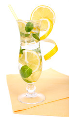 Glass of cocktail with lemon and mint isolated on white