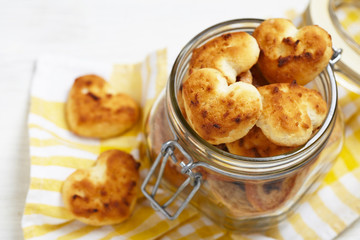 Coconut cookies heart shape in glass jar