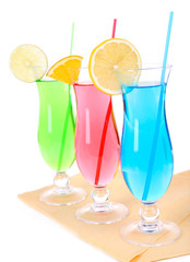 Glasses of cocktails isolated on white