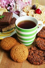 Cup of tea and sweets close up