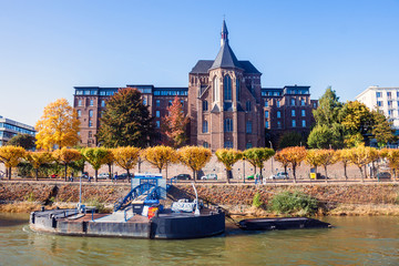 Fototapeta na wymiar Buildings next to river Rhine in Bonn, Germany