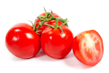 Fresh tomatoes isolated on white