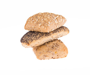 Assortment of baked bread isolated on a white background.