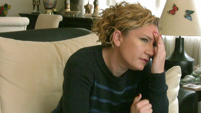 Woman having sinus pain