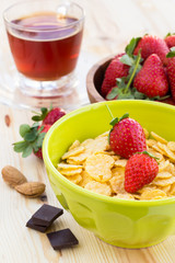 Delicious and healthy breakfast with strawberry and cornflakes
