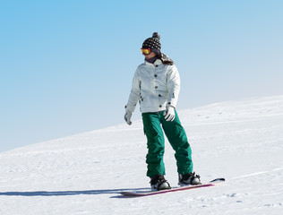 Fototapeta na wymiar Snowboarder at a ski resort