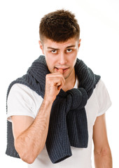 young man showing negative sign on white background