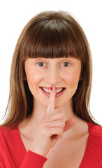 Fototapeta premium young woman shows sign and symbol by hands on white background