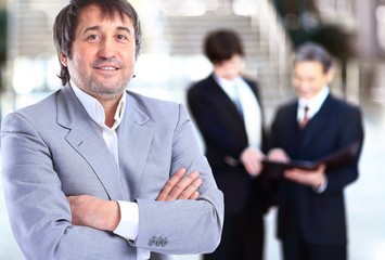 Portrait of a smiling handsome businessman