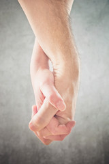 Couple holding hands