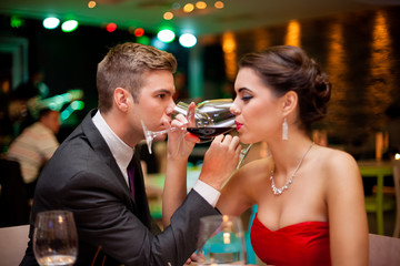Romantic couple drinking wine