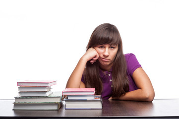 bored girl sitting with books