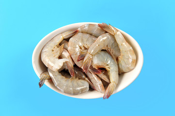 raw prawns in a white bowl