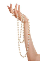 Woman hand with pearls