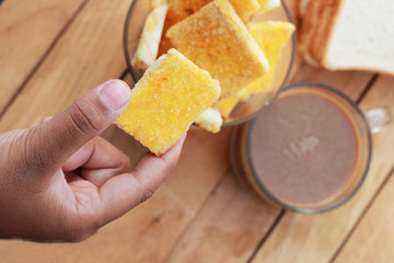 Toast with butter and sprinkling with sugar - hot coffee