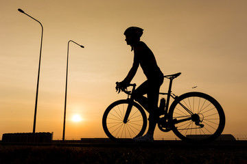 Obraz premium man biking on the road