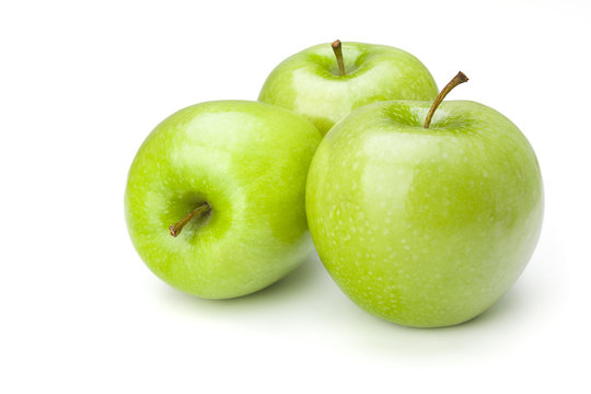three green apples on white background