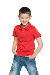 Laughing young boy in a red shirt