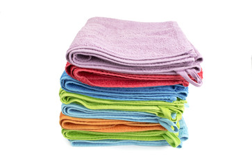 A stack of folded bath towels