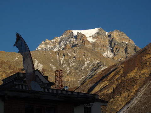 High mountain named Yakwakang at sunset, view from Muktinath