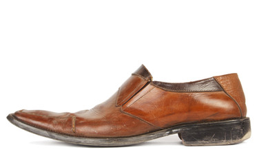 Used brown shoes isolated
