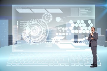 Composite image of thoughtful businessman holding pen to chin