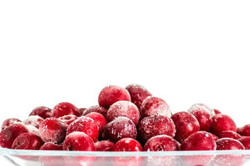 Frozen cherries on white background