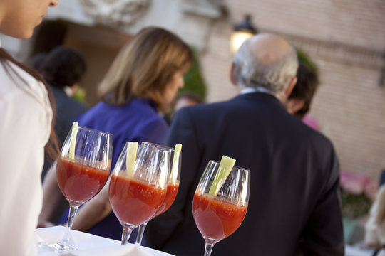Professional catering service serving drinks to guests