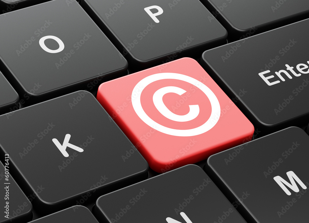Poster law concept: copyright on computer keyboard background