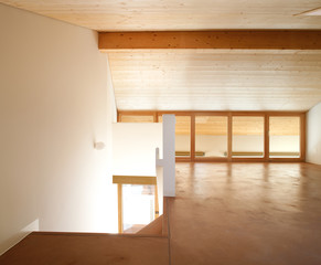 Apartment on different floors with laminate floor and wooden cei