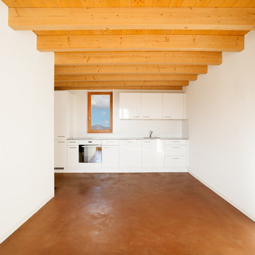 Apartment on different floors with laminate floor and wooden cei