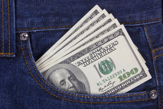 Many U.S. dollars in jeans pocket
