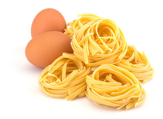 Italian egg pasta nest isolated on white background 