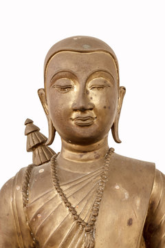 Buddhist saint statue isolated on white background