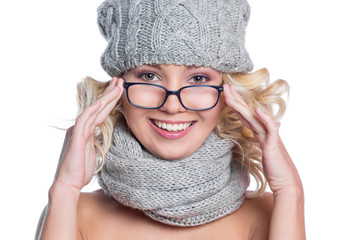 Woman in a hat, scarf and glasses